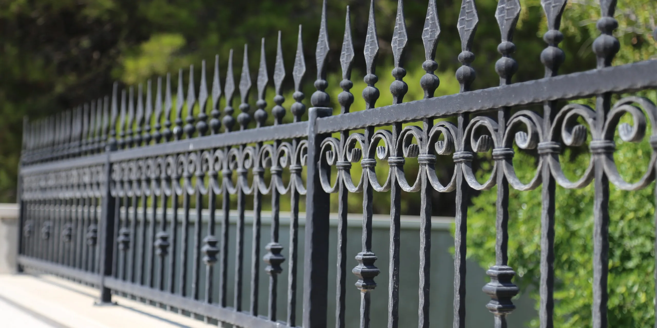 Beautiful metal fence in the park or in the garden